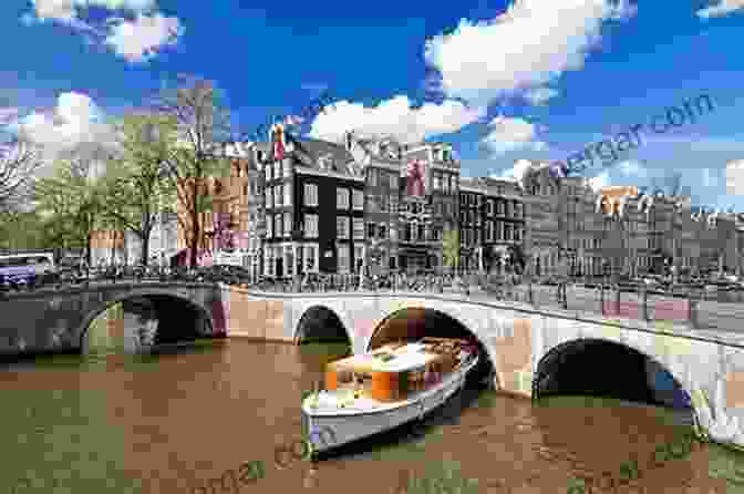 A Boat Floating Down A Canal In The Netherlands A Float Down The Canal