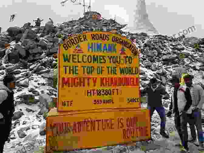 A Car Driving Through The Khardung La, The Highest Motorable Pass In The World Re Discovery Of Ladakh: A Photographic Excursion Through The Oasis Of Peace And Harmony