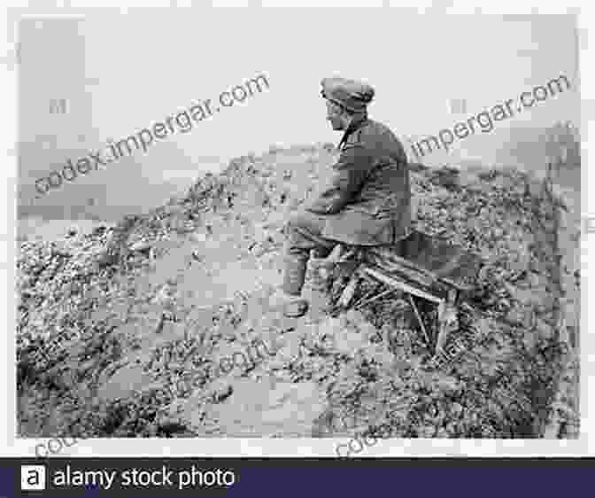 A Lone Soldier Sitting On A Rock, Lost In Thought Amidst The Ruins Of War. 13 Months: In The Bush In Vietnam In 1968