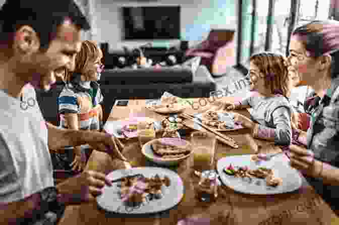 Happy Family Enjoying A Healthy Meal Together Around The Dinner Table Innocent Hungry?: The Innocent Recipe For Filling Your Family With Good Stuff